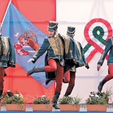 Historical reenactors, dressed as Hussars, dance to 'toborzó', a historical recruitment music
