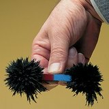 Iron powder on the poles of a bar magnet