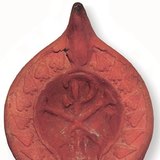 Christogram on a candle