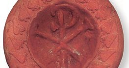 Christogram on a candle