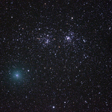 Comet Hartley passing the double cluster in Perseus