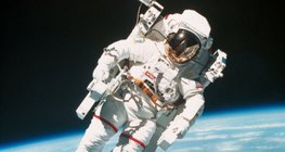 An astronaut with the Earth in the background