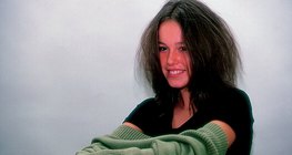 The sweater's electric charge is the opposite of our hair's when dressing