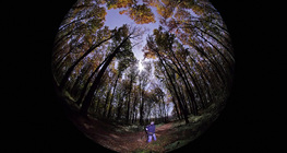 View of a full moon through a fish-eye lens
