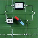 Current induced by a rotating magnet
