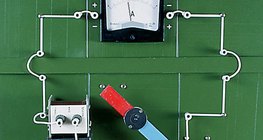 Current induced by a rotating magnet