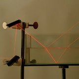 Refraction and reflection of laser light at the boundaries of air and water and water and glass Refraction and reflection of laser light at the boundaries of air and water and water and glass