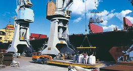 Huge cranes are used for loading in the port of Gdańsk