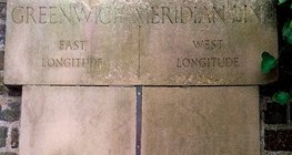 A metal strap marking the prime meridian (a longitude of 0 degrees) in Greenwich