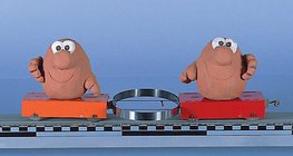 Pushing away two objects with a spring