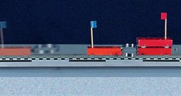 Carts of different masses bouncing away with a spring