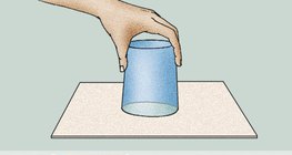 Why does the water stay inside the glass?