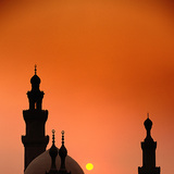 Sunset over a mosque in Cairo