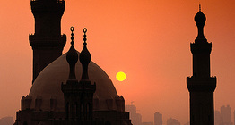 Sunset over a mosque in Cairo