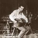 Béla Bartók playing hurdy-gurdy