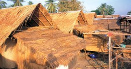 Houses built on piles in Southeast Asia