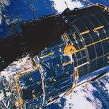 The Hubble Space Telescope with the Earth in the background
