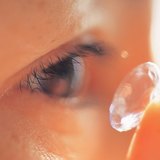Putting in a contact lense