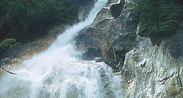 Fast-flowing, high-falling mountain stream