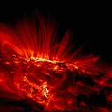 The Sun's magnetic field lines are visible in the area surrounding the sunspots