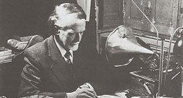 Zoltán Kodály using the phonograph to check the noted melodies