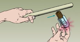 The energy of the electric field is reduced when the bulb flashes